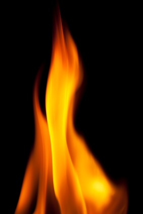 a burning flame with a black background.